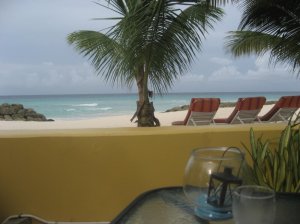 wall separates breakfast area from sandy beach - nice